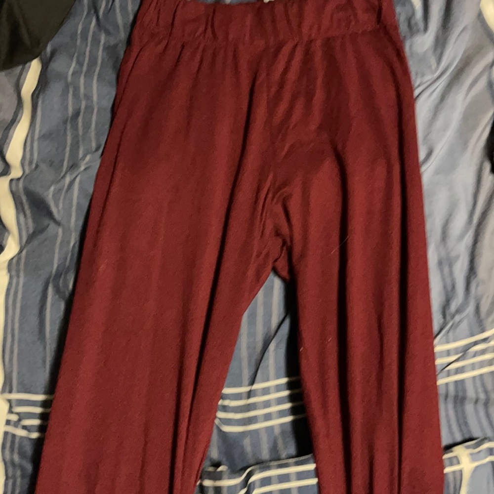 Burgundy leggings.